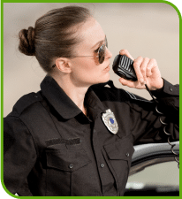 Lady law enforcement officer talking on the microphone