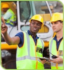 Two construction workers dicussing work
