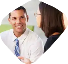 Two coworkers having a conversation