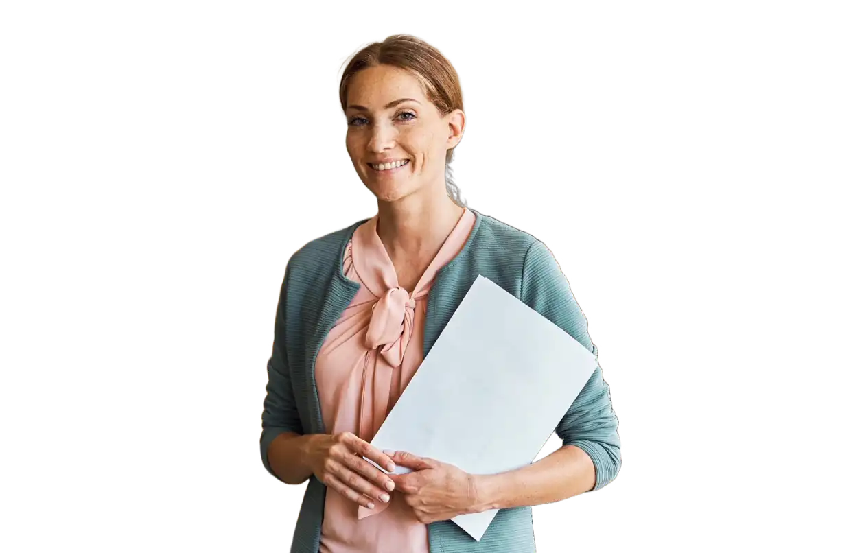 Woman smiling and holding a laptop